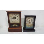Postman Style Mantle Clock, in an ebony coloured case, 25cm x 18cm & Postman’s “Cottage No 2” Mantle