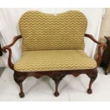 In the style of Butler of Dublin – a two- seater Settee with swan neck shaped side supports and