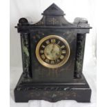 Tall black marble Mantel Clock, with green marble columns and a partly black dial with gold numerals