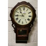 8-day American Wall Clock, in a stained beech case, stamped “S FALLERS, BALLINASLOE”, 80cm x 44cm