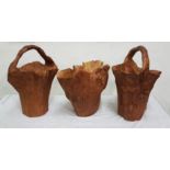 A Pair of carved Indonesian Root Buckets with Handles and a similar open bucket, each 48 cm h (3)