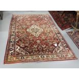 Fine woven Iranian Carpet with a unique all-over pattern, full pile, red ground, 1.35m x 2.18m