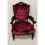 Victorian Mahogany Framed Armchair, a carved pediment over the button detailed back and turned and