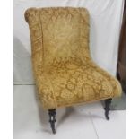 Victorian Mahogany Slipper Chair, on turned ebony front feet, castors, yellow floral fabric