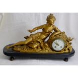Ornate Mantle Clock, featuring a spelter figure of a reclining lady, painted gold and raised on