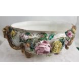 Ornate Oval shaped porcelain Fruit Bowl, all borders having applied colourful flowers, with gold
