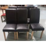 A set of 6 as new brown leatherette covered contemporary dining chairs, pine legs