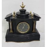 Black marble Mantel Clock with a black face and brass doric-shaped columns, acorn shaped finials,