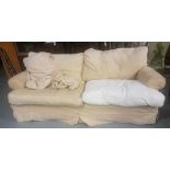 Large 4-seater Sofa with loose covers to the feather cushion seats