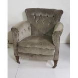 Victorian Low-Back Armchair, with green velvet upholstery, button back, on turned front legs