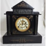 Ansonia black marble Mantel Clock with a visible escapement and a white dial, with raised gilt