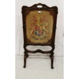 Victorian Rosewood Framed Fire screen, with scrolled borders and feet, with armorial tapestry inset,
