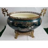 Late 19th C oval shaped French Pottery Jardinière, with galleried brass top, and decorative brass