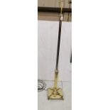 Polished brass standard lamp, with Adams style décor, on 4 toes, re-wired