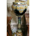 Doulton Lambeth Jardinière on green stand, glazed floral decoration 105cm h (top of stand damaged)