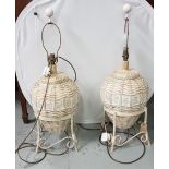 Matching pair of terracotta basket-design table lamps on stands, electric, each 80cm high