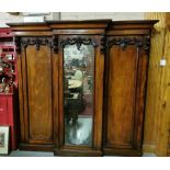 Lg. Victorian Mahogany Wardrobe with a central mirrored door, silvered edging and two side closets