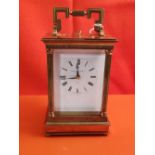 Brass cased Carriage/Bracket Clock, the white dial stamped MATTHEW NORMAN, LONDON, a double fusee