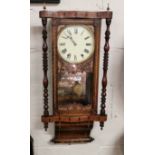 Wall Clock in a marquetry inlaid case, mirrored back and brass finials, 96cm x 40cm