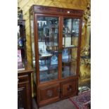 Mid 20th C Chinese Rosewood 2 glass door Display Cabinet with asymmetrical glass shelves, above 2