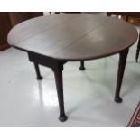 George III Mahogany Drop Leaf Side Table with oval ends, on sabre legs with pad feet, 106cm d,