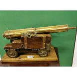 Hand crafted Brass Cannon with 41cm barrel and drilled vent, raised on a stepped wooden carriage