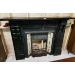 Black Slate Fireplace with grey marble inlays to each side jam, also a later cast iron insert with
