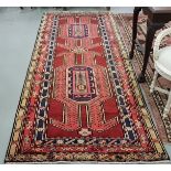 Large hand-woven Persian Meshkin Runner, with a unique bright medallion design, burgundy ground, 1.