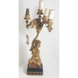 Ormolu figurative candelabra, 4-branches, on ebony base, figure of a cherub 50cm h