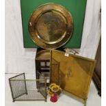 Brass fire screen, flowerpot design doorstop, a large circular brass plaque & a low spark guard (4)