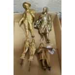 5 ornamental Spelter Clock Mounts – various figures including a farmer, scholar and a musician, from