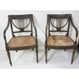 Matching Pair of Regency Ebonised Carver Chairs, with lyre-design backs and turned side arms,