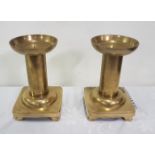 A Pair of large Circular Brass Candle Sticks, on a square stand, each 25cm h x 16cm sq