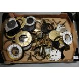 Box of Clock Parts for small Clocks – springs, dials etc