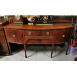 Mahogany Sideboard with two cabinet doors and a central cutlery drawer in between, circular brass