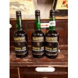 Three bottles of Harvey Bristol Dry medium dry sherry.