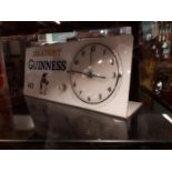 Rare Draught Guinness Penguin electric clock.