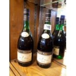 Two bottles of1970s release of Rémy Martin's Fine Champagne VS Cognac.