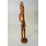 Tall Altar Guardian figure (light wood). Senufo, Ivory Coast.
