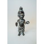 Small figure of a Courtier with manilla (bronze currency possibly 19th C.) Benin, Edo, Nigeria.