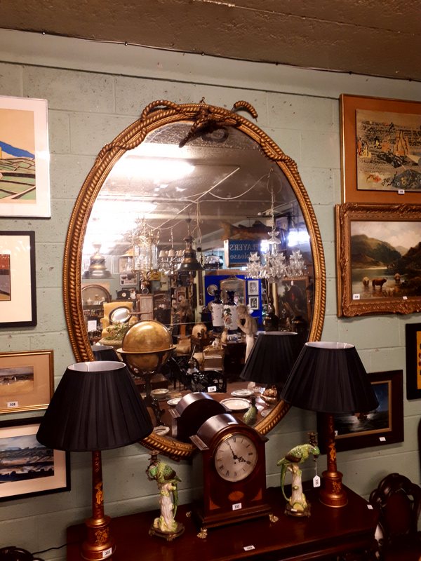 Large early Victorian oval gilt wood wall mirror {198 cm H x 153 cm W}.