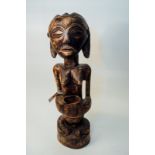 Large Kuba female Divination figure (excellent patina, bowl with traces of muti).