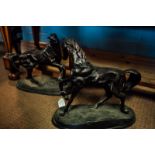 Pair of decorative bronze model of a prancing horse.