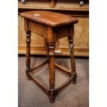 19th. C. pine shop keeper's stool raised on turned legs.