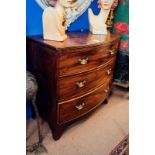 Georgian mahogany bow fronted three draw chest of draws with original brass handles {90 cm H x 92