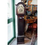 Edwardian mahogany granddaughter clock with brass dial.