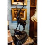 Pair of exceptional bronze stags on Kilkenny marble base. 74cm tall.