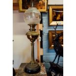 Victorian brass oil lamp with brass bowl original etched football glass shade. 80cm high.