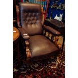 Edwardian mahogany open arm chair on turned legs.