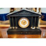 Edwardian slate and brass mantle clock.